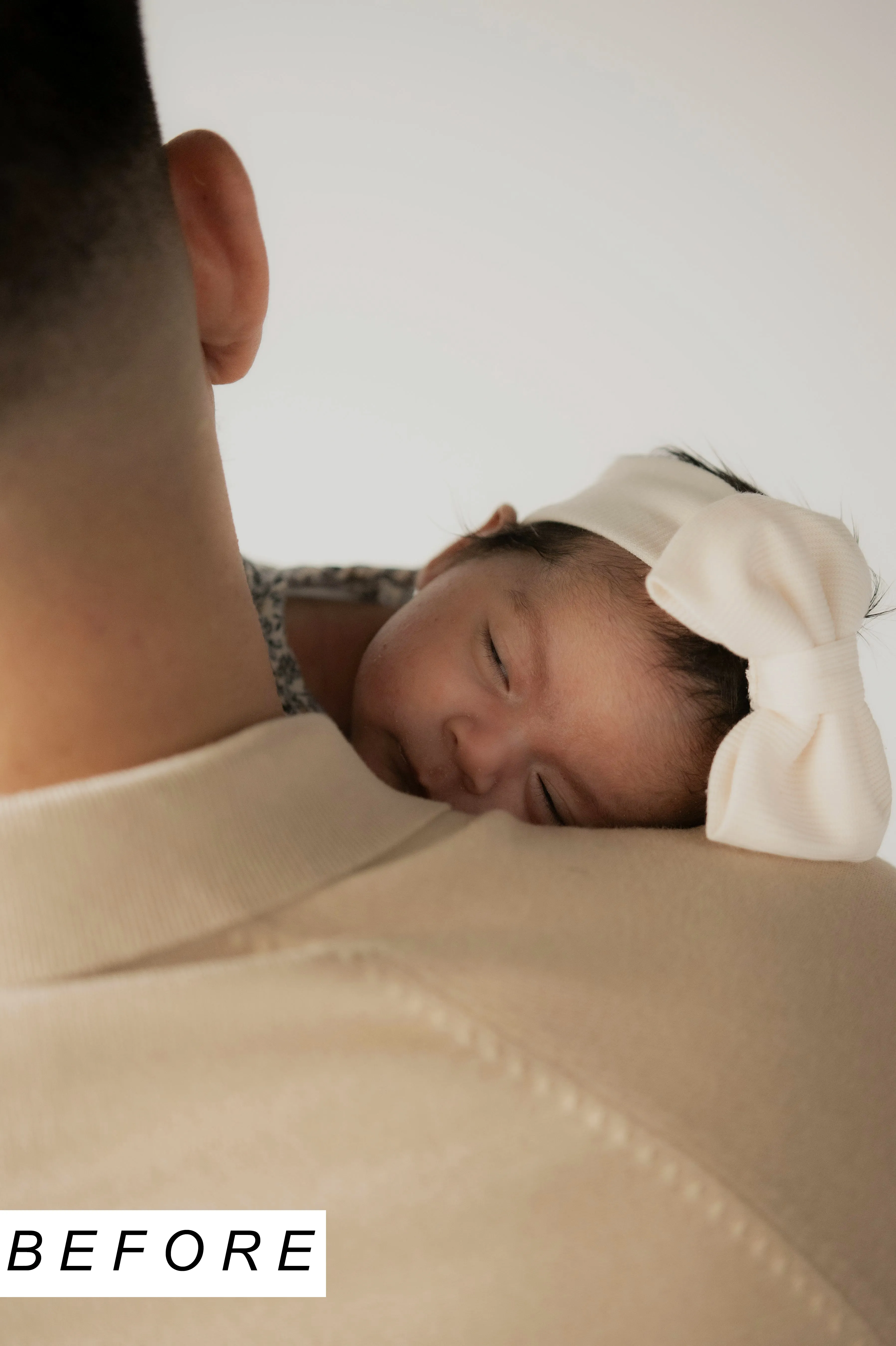 Newborn with father photo before retouching